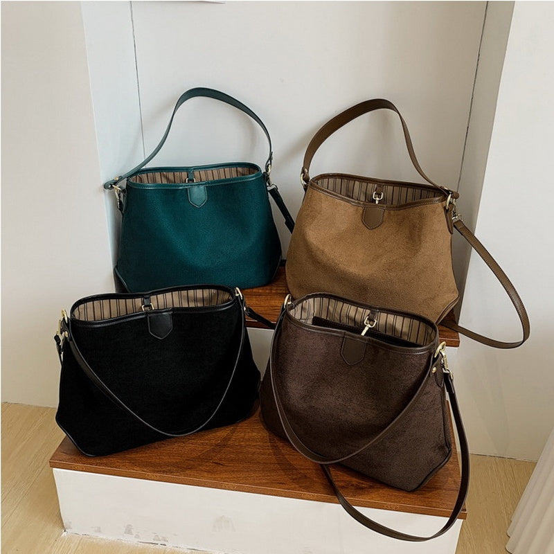 Collection of vintage retro soft leather tote shoulder bags in khaki, black, green, and brown colors.